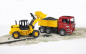 Preview: MAN TGA Kipplastwagen mit Gelenkradlader FR130